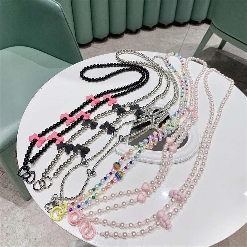 🎀 Correa Larga Bohemia con Piedras y Perlas – Lanyard de estilo elegante para celular, anti pérdida y con diseño femenino
