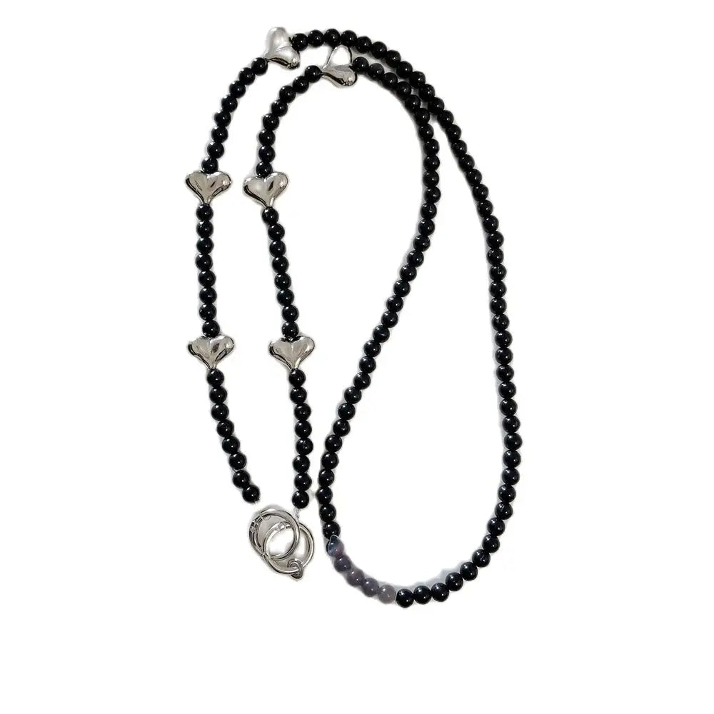 🎀 Pulsera con Lazo Plateado y Perlas – Lanyard de lujo con diseño de cadena y dije, anti pérdida, ideal para celulares