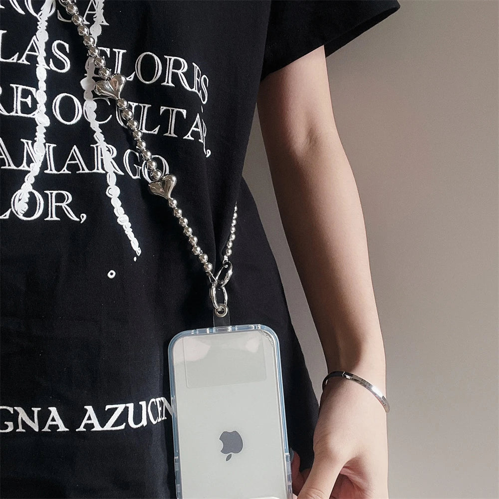 🎀 Pulsera con Lazo Plateado y Perlas – Lanyard de lujo con diseño de cadena y dije, anti pérdida, ideal para celulares