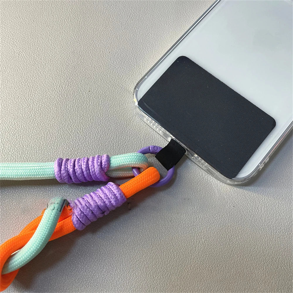🎀 Pulsera Coreana con Nudo – Correa colorida anti pérdida para celular, tipo brazalete, compatible con iPhone y Samsung