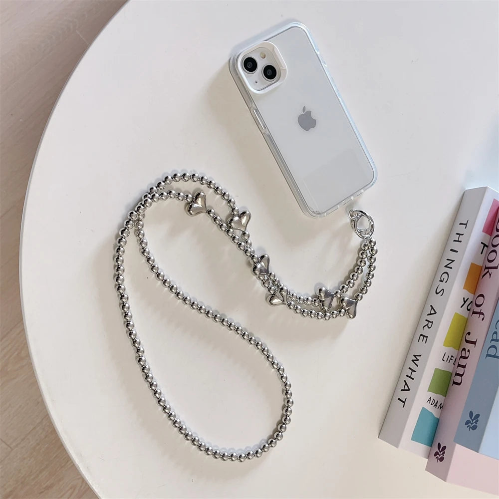 🎀 Pulsera con Lazo Plateado y Perlas – Lanyard de lujo con diseño de cadena y dije, anti pérdida, ideal para celulares