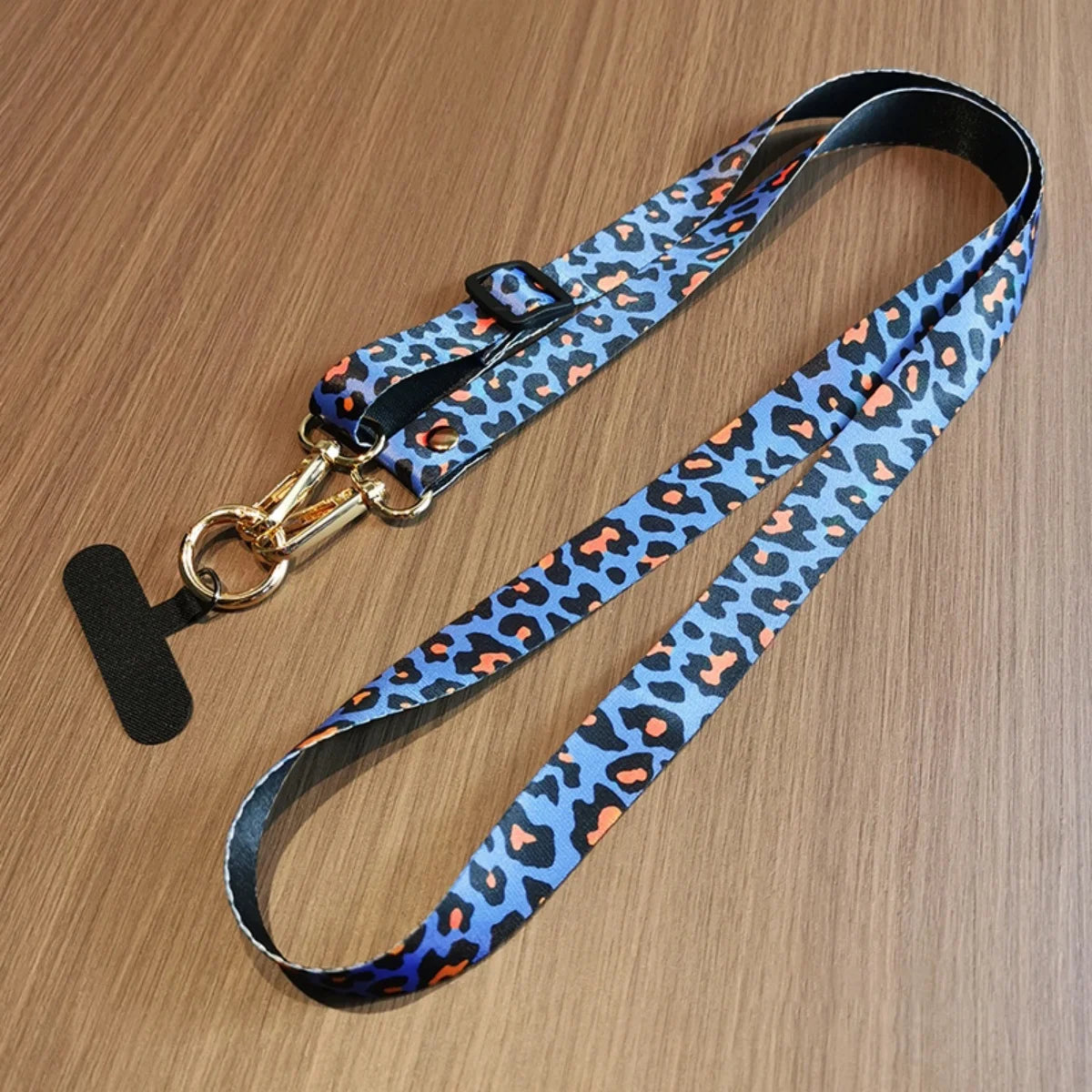 🎀 Lanyard con estampado de leopardo – Correa ajustable para celular, anticaída