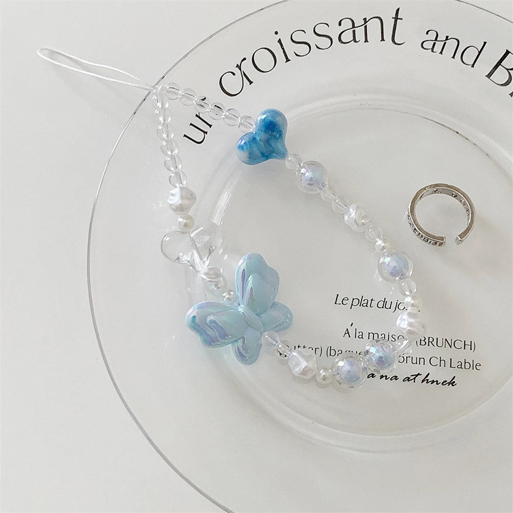 🎀 Lanyard con Mariposa 3D y Corazón – Cadena colgante para celular, charm femenino, anti pérdida, ideal para mujeres