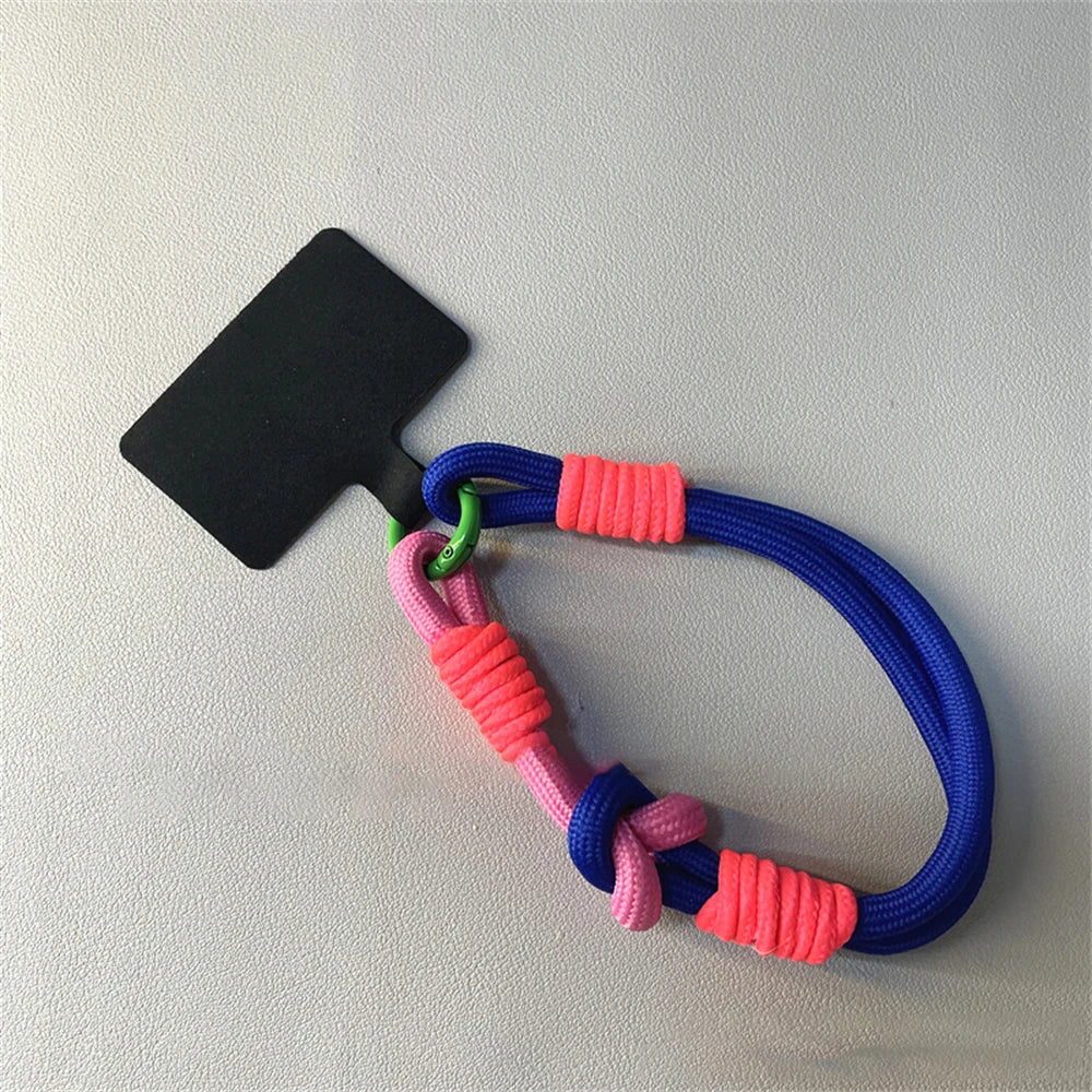🎀 Pulsera Coreana con Nudo – Correa colorida anti pérdida para celular, tipo brazalete, compatible con iPhone y Samsung
