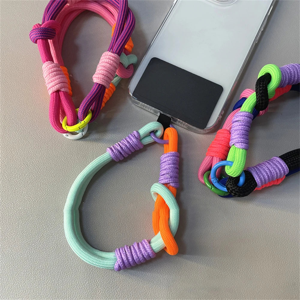 🎀 Pulsera Coreana con Nudo – Correa colorida anti pérdida para celular, tipo brazalete, compatible con iPhone y Samsung
