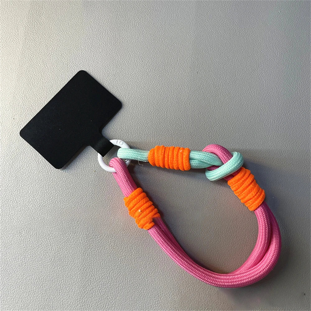 🎀 Pulsera Coreana con Nudo – Correa colorida anti pérdida para celular, tipo brazalete, compatible con iPhone y Samsung