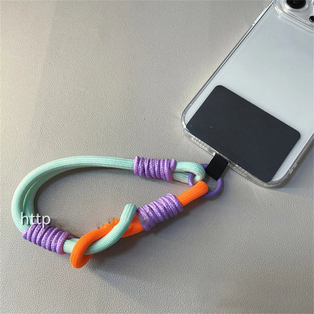 🎀 Pulsera Coreana con Nudo – Correa colorida anti pérdida para celular, tipo brazalete, compatible con iPhone y Samsung