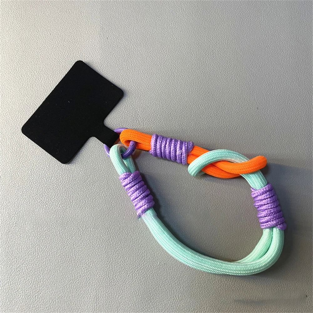 🎀 Pulsera Coreana con Nudo – Correa colorida anti pérdida para celular, tipo brazalete, compatible con iPhone y Samsung