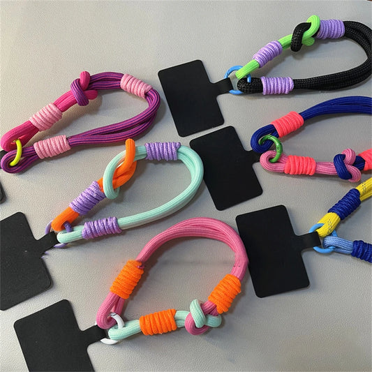 🎀 Pulsera Coreana con Nudo – Correa colorida anti pérdida para celular, tipo brazalete, compatible con iPhone y Samsung